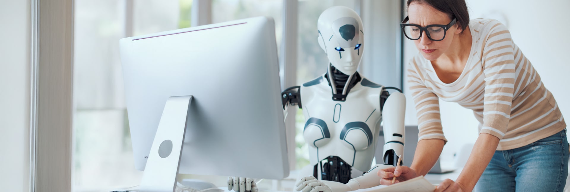 Robot and women working together